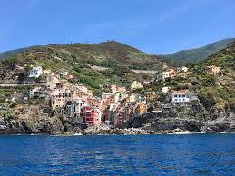 Wikimedia commons has media related to villages in italy. Cinque Terre Delightful Tiny Hamlets Perched On Hills And Inlets Cascading Down To The Sea Side By Side Form An Area In The Ligurian Coast Of Italy