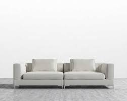 Customer service said they product is damaged and cannot be replaced or refunded due to water damage and their outdoor furniture is not water proof. Antonio Sofa White Fabric Sofa Modern White Sofa Rove Concepts