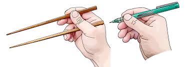 Lay the chopsticks next to one another on the table. Do You Hold Chopsticks Like You Hold A Pen Chopsticks