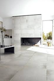 Large Concrete Tiles This Rooms Elegant Palette Is Emphasized By The Gorgeous Tiling Large Concrete Bat Tile Floor Living Room House Flooring Living Room Tiles