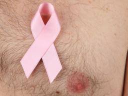 Male breast cancer can exhibit the same symptoms as breast cancer in women, including a lump. Male Breast Cancer Protein Discovery Could Yield New Treatments