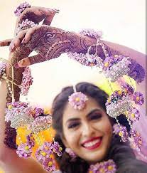 All The Quirks And Effervescence Saved For The Mehendi Celebrations Double Tap For Th Wedding Flower Jewelry Floral Jewellery Flower Jewellery For Mehndi