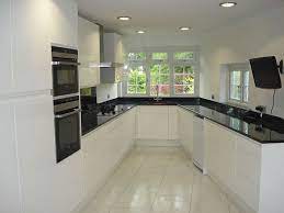 To go that one step further, decorate one side of the kitchen with black worktops and white units, and the other side of the kitchen with white worktops and black units. Top 3 Colour Schemes To Complement A Black Sparkle Kitchen Worktop Worktop Express Blog