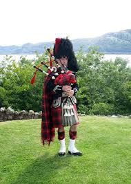 A musician plays the bagpipes in the fields at sunset. Scotland Bagpipes Instrument Scottish Culture Tartan Musician Highlands Kilt Scotsman Bagpiper Pikist