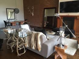 We manufacture antler furniture and crafts, which are distinguished by quality, extraordinary workmanship precision and unique design. Antler Sofa Table Natural Elk And Mule Deer Antler Base Glass Top