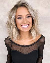 This medium length hairstyle in its all shades of whiteness looks gorgeous with the curls. 25 Medium Blonde Hairstyles To Show Your Stylist Pronto Southern Living