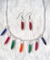 10 Ways To Recycle Christmas Lights Greenopolis Christmaslightspictures Christmas Jewelry Jewelry Crafts Christmas Light Necklace