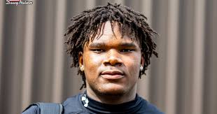 Justus Terry 2025 Georgia football commitment viral sensation barber Bulldog