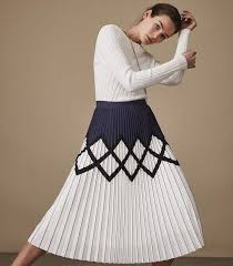 Black And White Pleated Midi Skirt Elsa Printed Knife Pleat Midi Skirt The Elsa Knife Pleat Skirt In White Is Adorned With A Graphic Geometric Print In Pleated Skirt Outfit Fashion Womens Skirt