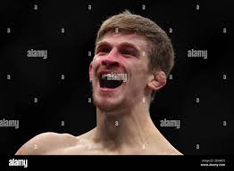 LONDON, UK. MAR 19TH Arnold Allen celebrates his victory over Dan Hooker  during UFC Fight Night 204 at the O2 Arena, Greenwich