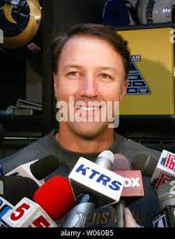 St. Louis Rams backup quarterback Scott Covington talks with reporters  Friday, Dec. 27, 2002, at the team's training facility in St. Louis. (AP  Photo/James A. Finley Stock Photo
