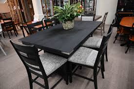 The set consists of a table with a spacious top, and four counter stools featuring upholstered seat cushions to help you easily set up your dining room. Dining Room Pieroway S Furniture Stores