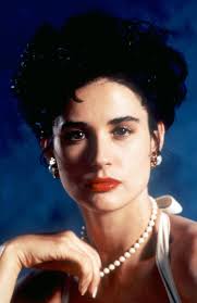 I was thinking about a movie from 1991 with Demi Moore and Chevy Chase. Dan  Akroyd played 2 roles. It was considered a comedy/horror. It was called  Nothing But Trouble