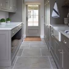 Modern Farmhouse Kitchen With Gray Cabinets And White Quartz Counter Tops And Farmhouse Sink Earl Grey Lim Grey Kitchen Floor Kitchen Renovation Grey Cabinets