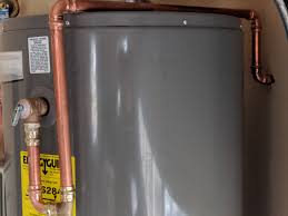 This safety valve releases water and pressure if it becomes too high inside the tank. Hot Water Heater Pressure Relief Valve