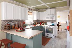 Create the illusion of more space in a small kitchen by painting the cupboards in the same colour as the walls. Fall Kitchen Makeover With Natural Accents Traditional Kitchen Charlotte By Lowe S Home Improvement Houzz