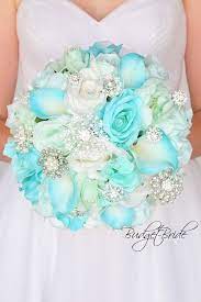 Tiffany blue wedding bouquets and bridal party flowers. Tiffany Blue Bridal Bouquet Gold Davids Bridal Wedding Flowers Tiffanyblue Wedding Weddin Bridal Wedding Flowers Blue Wedding Flowers Wedding Flower Guide