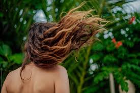 Perfectly imperfect, that's what people say. Brown Ombre Summer Hair Flying In The Air With A Green Palms In A Background By Sanja Lydia Kulusic