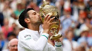 Novak djokovic saved two championship points in wimbledon's longest singles final to retain his title in a thrilling win over roger federer. 2z2cpxnpfyjwcm