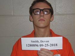 Prisoner charged with assault and possessing a knife