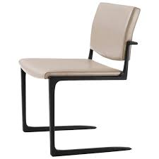 holly hunt shadow dining chair in aluminum frame with leather upholstered seat upholstered seating dining room chairs modern cantilever dining chair