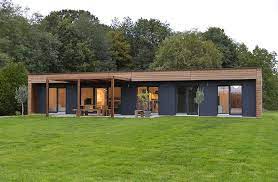 Maison A Ossature Bois Design Et A Toit Plat Maison Ossature Bois Constructeur Maison Maison Prefabriquee