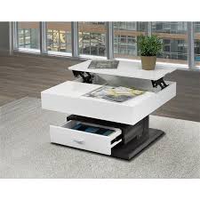 Glass lift top coffee table should always look refreshing, unique and elegant, as that is where you would sit for a fresh cup of coffee and feel rejuvenated. Brassex 29 5 In X 29 5 In X 17 7 In White And Grey Rotating Square Lift Top Coffee Table With Storage Drawer 226 02 Rona