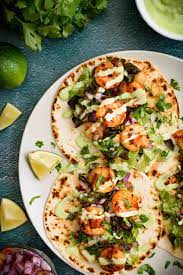 The fish was so flavorful and spicy, but the heat was mellowed out by the slaw and creamy avocado dressing. Shrimp Tacos With Avocado Yogurt Sauce Pepper Delight