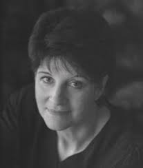 Kathy Kniery and Debra Weller, members of Tale Tellers, told stories at an  event for Fostering Connections. It was a fun afternoon! The children  received gifts, made crafts, visited with Santa, played