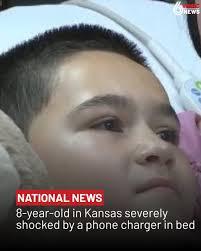 Lorenzo was sleeping with a phone plugged into a nearby charger. The  charger was plugged into an extension cord but was slightly unplugged.