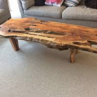 A classic trunk makes the top for this wooden coffee table. Coffee Tables Unique Wild Wood Furniture
