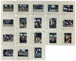 Group of slides: 1-3 Carl Fleischhauer and Host Drum; 4 Arena Director; 5  Head Singer of Host Drum; 6-14 Grand Entry; 15 Whipman David Blackbird;  16-18 San Juan Pueblo Buffalo Dance