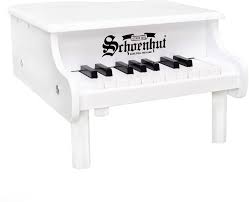 Amazon Com Schoenhut Baby Grand Piano 18 Keys Mini Keyboard Piano Education Learn To Play Piano Toddler Piano For Kids With Chromatically Tuned Baby Keys Learning Baby Piano Toy