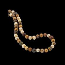 Pearls on a necklace should vary by no more than one half millimeter; Chocolate Pearl Necklace