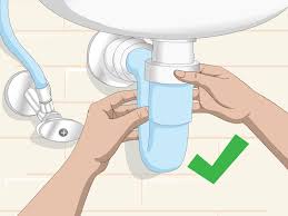 Make sure the trap arm has a slight downward angle toward the wall tee. 3 Ways To Clean A Sink Trap Wikihow