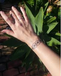 Vines wrapped around wrist tattoo. 50 Wrist Bracelet Tattoos For Women 2021 With Ankle Designs