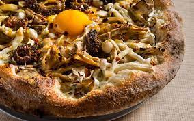 mixed wild mushroom pizza with fried eggs jean georges restaurants