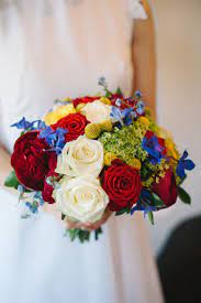 Blue bridal bouquets range from sky blue hues to vibrant dyed petals. Artistic Creative Colourful Farm Wedding Red Bridal Bouquet Red Bouquet Wedding Royal Blue Wedding Theme