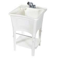 white freestanding laundry/utility sink