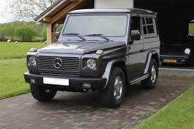 This truck has an amazing dark blue color with beige leather sits. Lot Art Mercedes Benz G320 1995