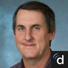 Dr. Bradford E. Halliday, MD