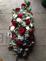 • red roses • white alstroemeria • blue flowers • clear glass vase with ribbon. Pin On Flowers
