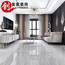 See pictures of interior designs and pros and cons of tile this living room features white couches and chairs together with the rug and sparkling tiles. 25 Best Living Room Ideas Stylish Living Room Decorating Ceramic Tiles For Living Room Floors