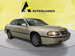 Image result for Yellow 2004 Impala