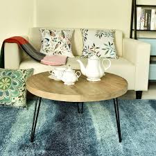 These tables are specially designed for placing refreshments such as coffee and other beverages in the home. Welland Rustic Round Old Elm Wooden Coffee Table Unfinished Furniture Living Room Furniture