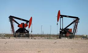 Oil prices slip on rising U.S. crude inventories | Reuters