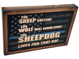 A man tries to live a normal life despite the fact that he sometimes turns into a sheepdog. The Sheepdog Thin Blue Line Wall Art Relic Wood