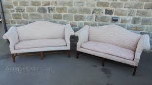 Wonderful intricate carving on the base of the settee. Pair English Country House Camel Back Sofas Antiques Atlas