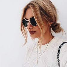 Low Bun And Round Glasses Hair Styles Cool Hairstyles Long Hair Styles