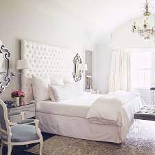 And don't forget all the bedroom furniture—from beds (maybe even tackle a diy headboard ) to cozy bedroom chairs. Interior Designer Katie Scott Designs Houston Texas This Is Glamorous White Master Bedroom White Bedroom Design Beautiful Bedroom Designs